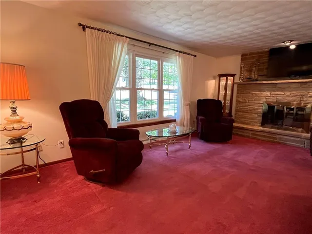 a room with furniture and a window