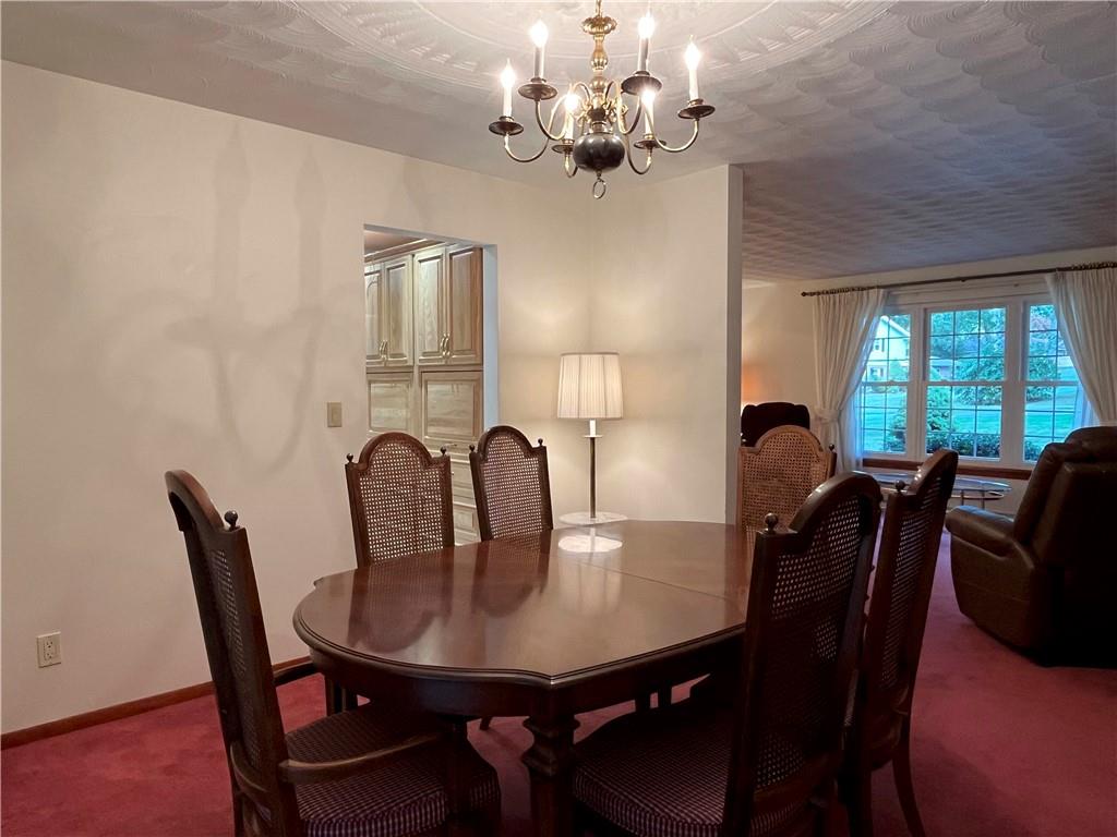 629 Clover Hill Road Somerset, PA 15501 - Photo 19 of 47 a view of a dining room with furniture window and outside view