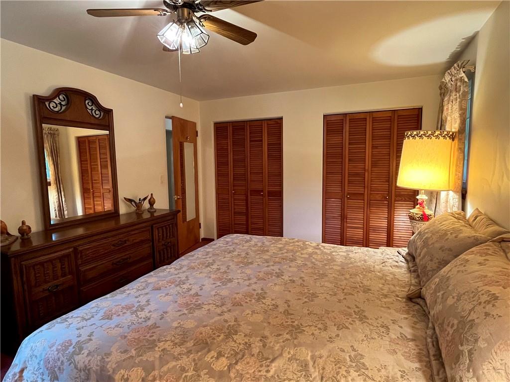 629 Clover Hill Road Somerset, PA 15501 - Photo 24 of 47 a bed room with a bed and a mirror