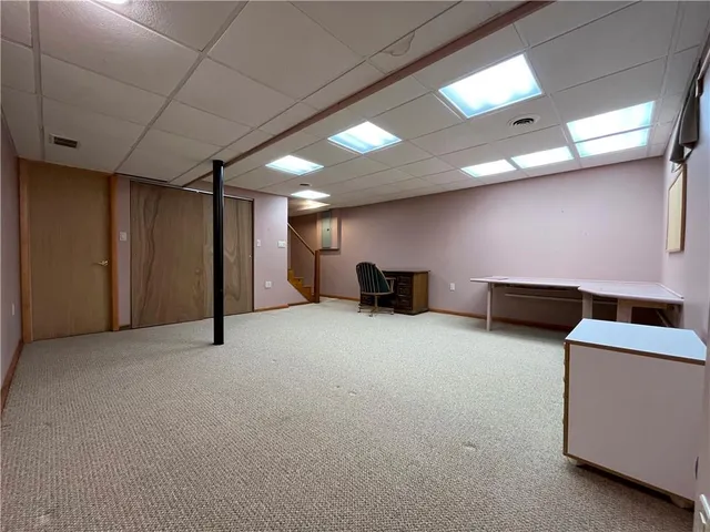 a bathroom with a toilet and a sink