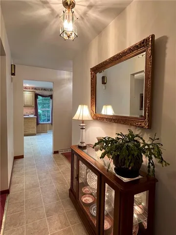 a bathroom with a sink a mirror and a window