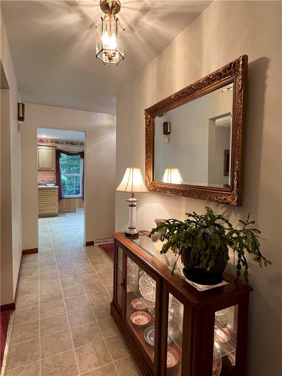 629 Clover Hill Road Somerset, PA 15501 - Photo 5 of 47 a bathroom with a sink a mirror and a window