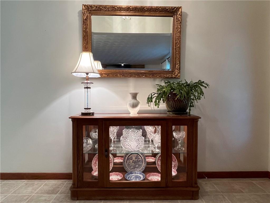629 Clover Hill Road Somerset, PA 15501 - Photo 6 of 47 a living room with furniture and a potted plant