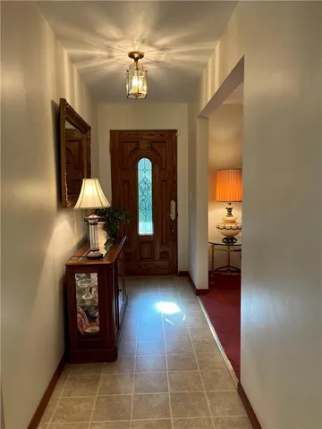 a view of an entryway with a workspace