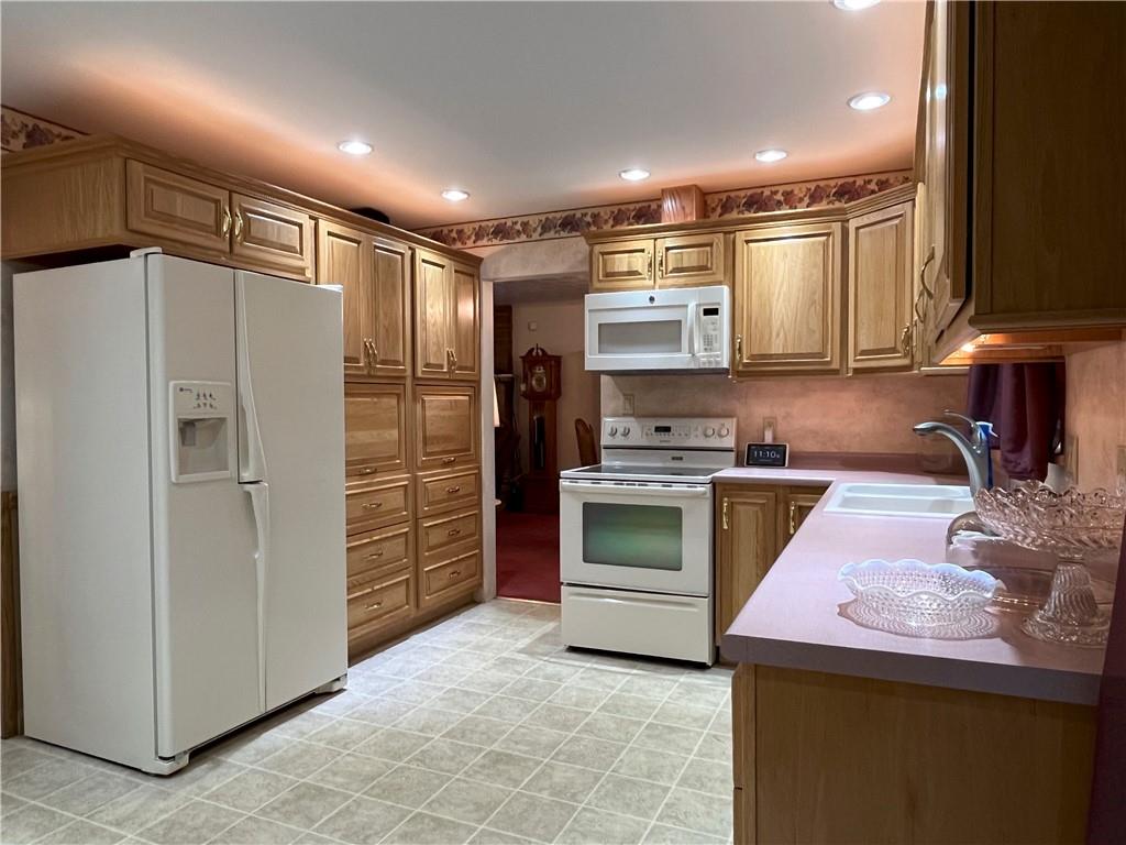 629 Clover Hill Road Somerset, PA 15501 - Photo 9 of 47 a kitchen with cabinets and stainless steel appliances