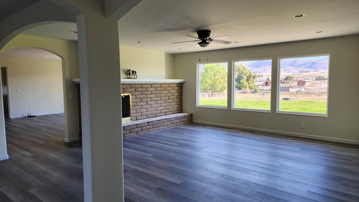 307 Mansfield Road Hollister, CA 95023 - Photo 62 of 62 a view of empty room with wooden floor and fan