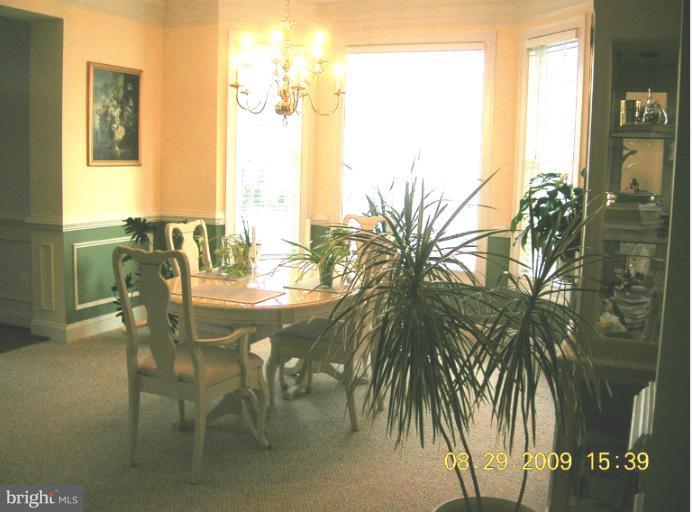 8919 Ricky Trevor Road Perry Hall, MD 21128 - Photo 21 of 27 a view of outdoor space with dining table and chairs