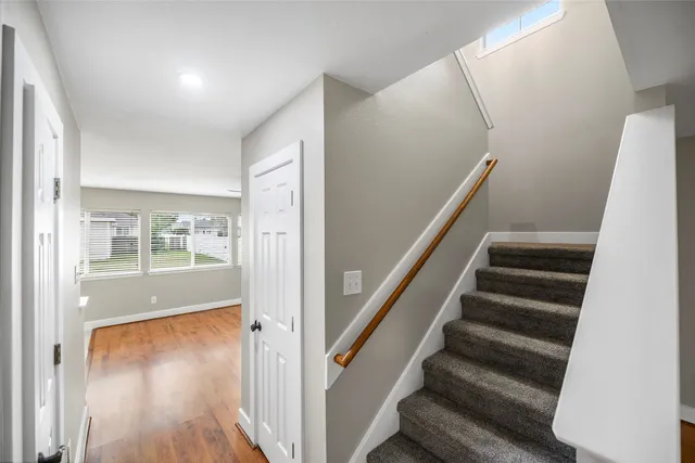a view of entryway with wooden floor