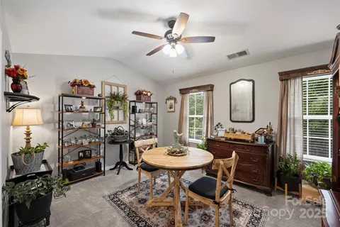 a view of a livingroom with furniture