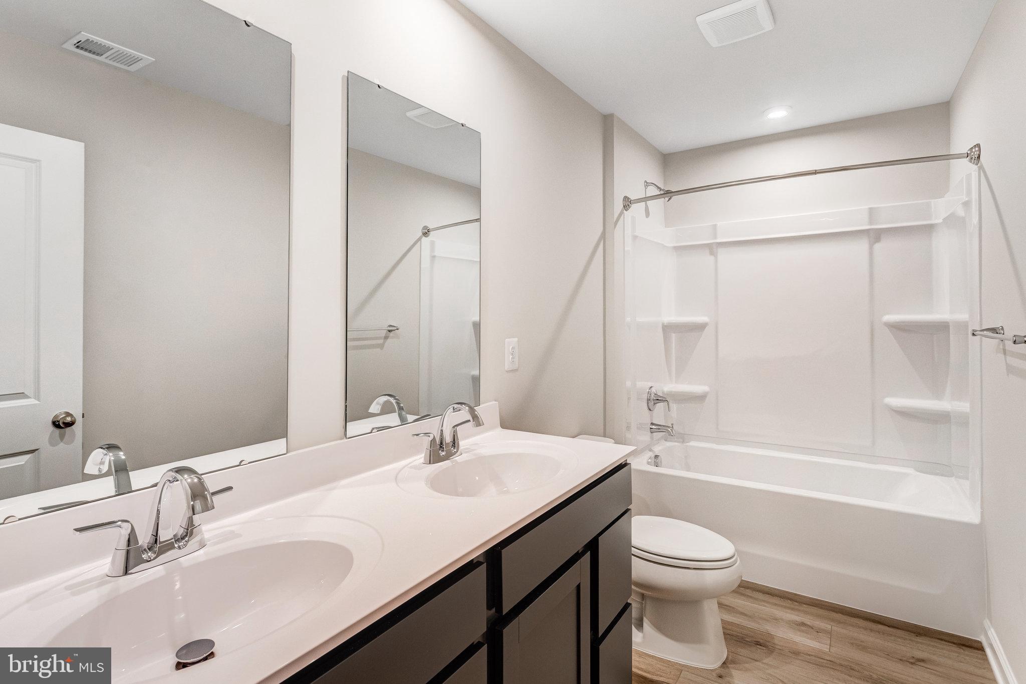 1714 Nebula Lane Stafford, VA 22554 - Photo 17 of 29 a bathroom with a sink toilet and shower