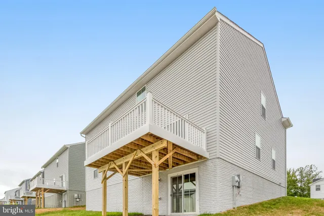 a view of a house with a street