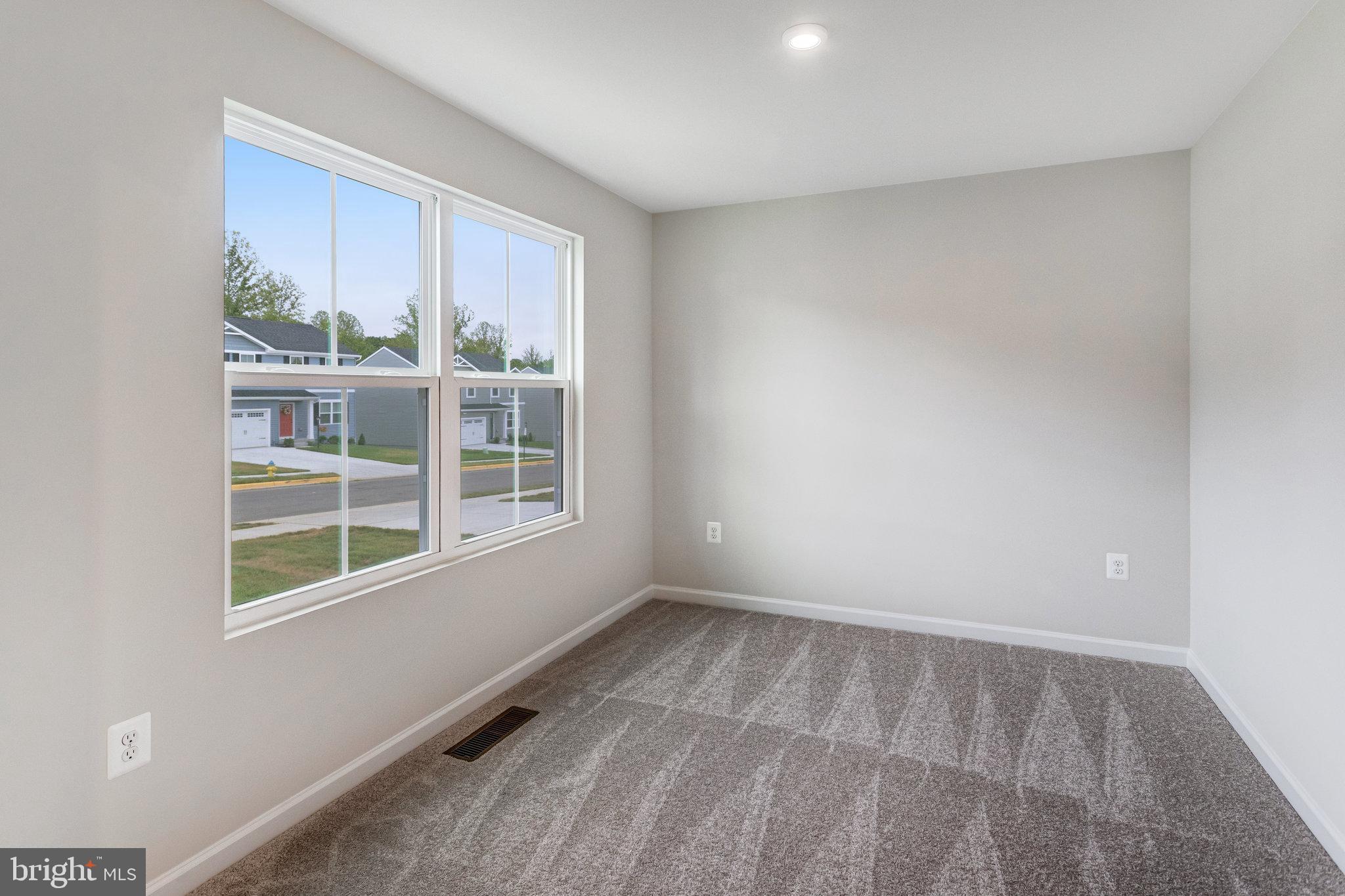 1714 Nebula Lane Stafford, VA 22554 - Photo 5 of 29 a view of an empty room with a window