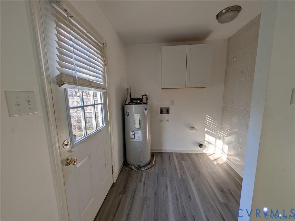 514 German School Road Richmond, VA 23225 - Photo 7 of 11 Laundry area with light wood-style flooring, hooku