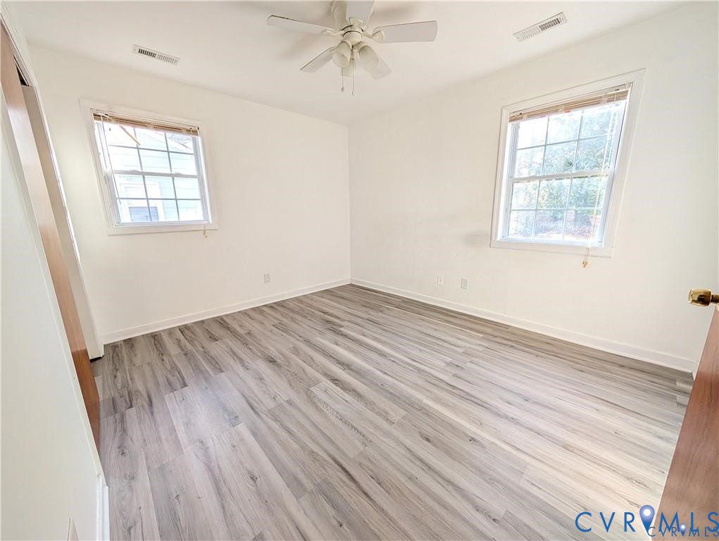 514 German School Road Richmond, VA 23225 - Photo 10 of 11 Empty room with light wood finished floors, plenty