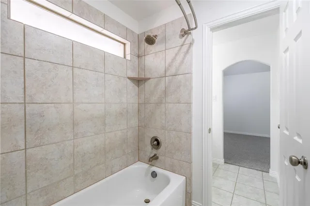 a bathroom with a bathtub