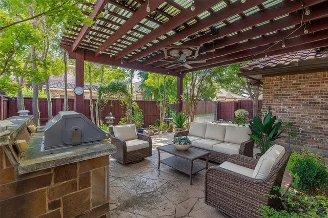 a outdoor living space with furniture and garden view