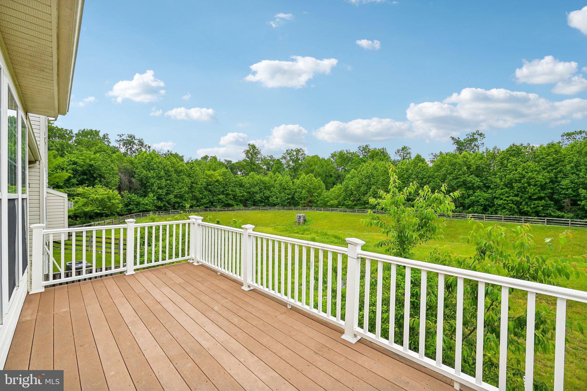 1461 Pangbourne Way Hanover, MD 21076 - Photo 14 of 51 a view of balcony with wooden floor and fence