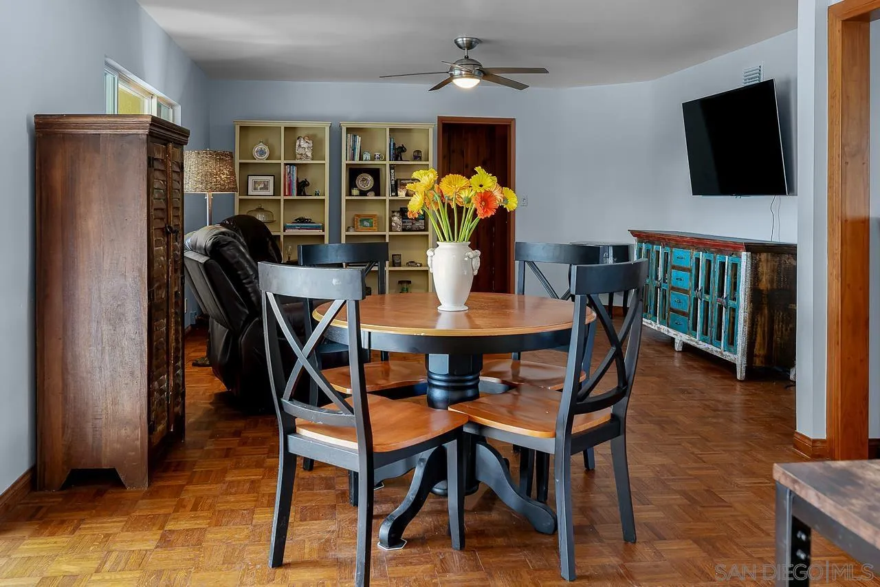 1410 Crestridge Drive Oceanside, CA 92054 - Photo 12 of 71 a dining room with furniture window and wooden floor