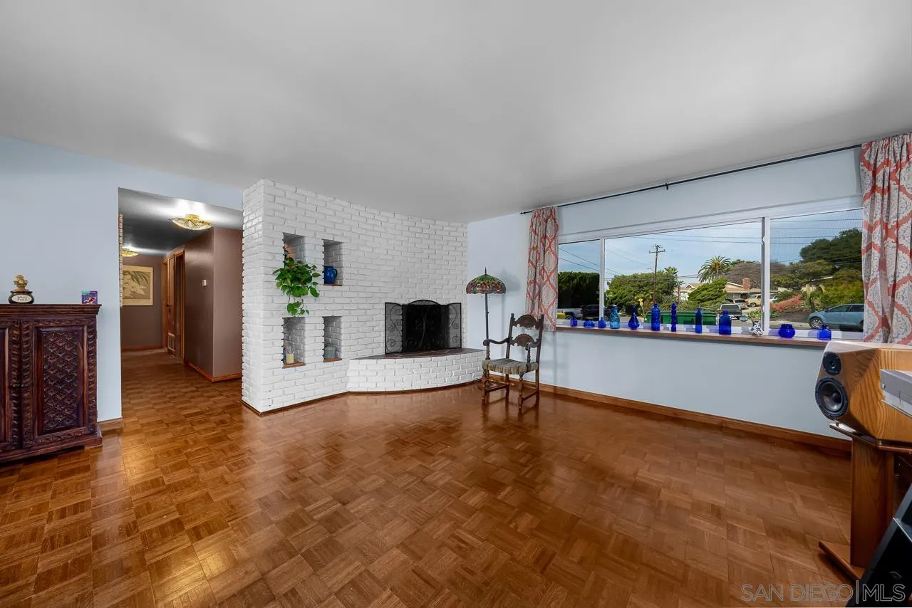 1410 Crestridge Drive Oceanside, CA 92054 - Photo 4 of 71 a view of a room with gym equipment and a large window