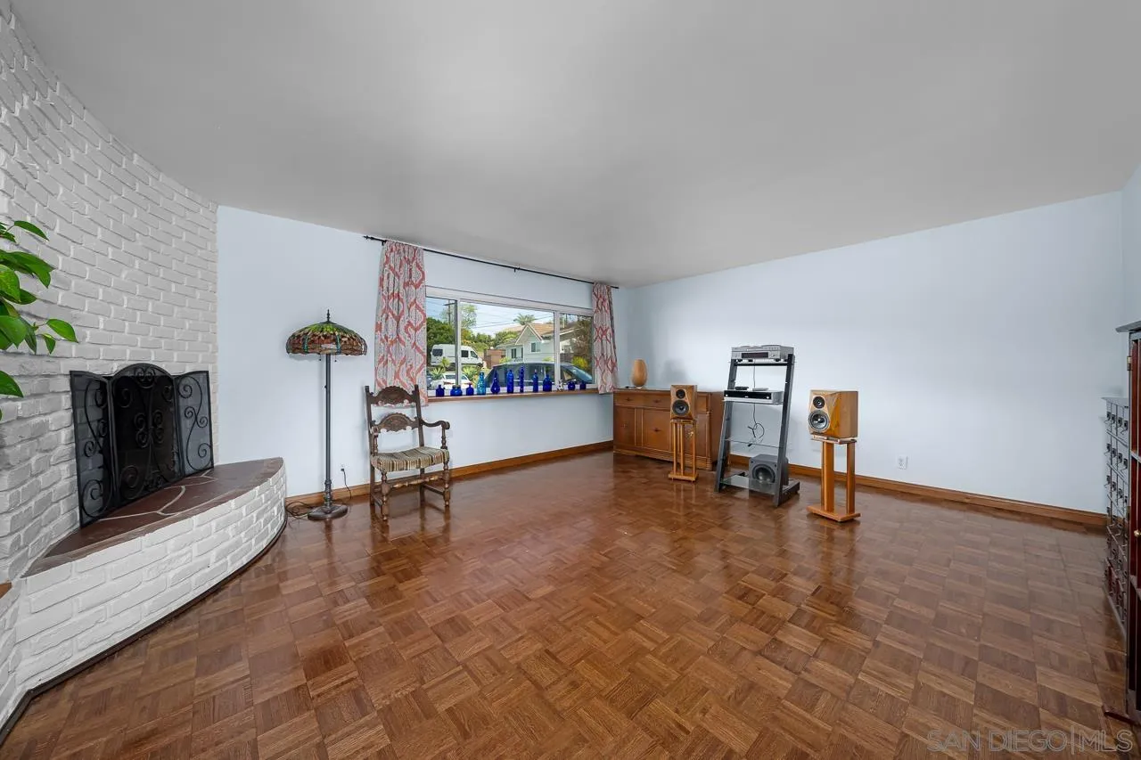 1410 Crestridge Drive Oceanside, CA 92054 - Photo 6 of 71 a living room with furniture and a flat screen tv