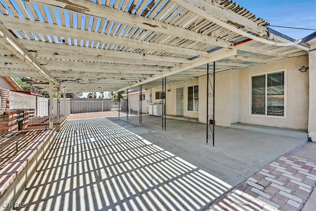 6384 West Desert Inn Road Las Vegas, NV 89146 - Photo 21 of 26 View of patio / terrace featuring a pergola