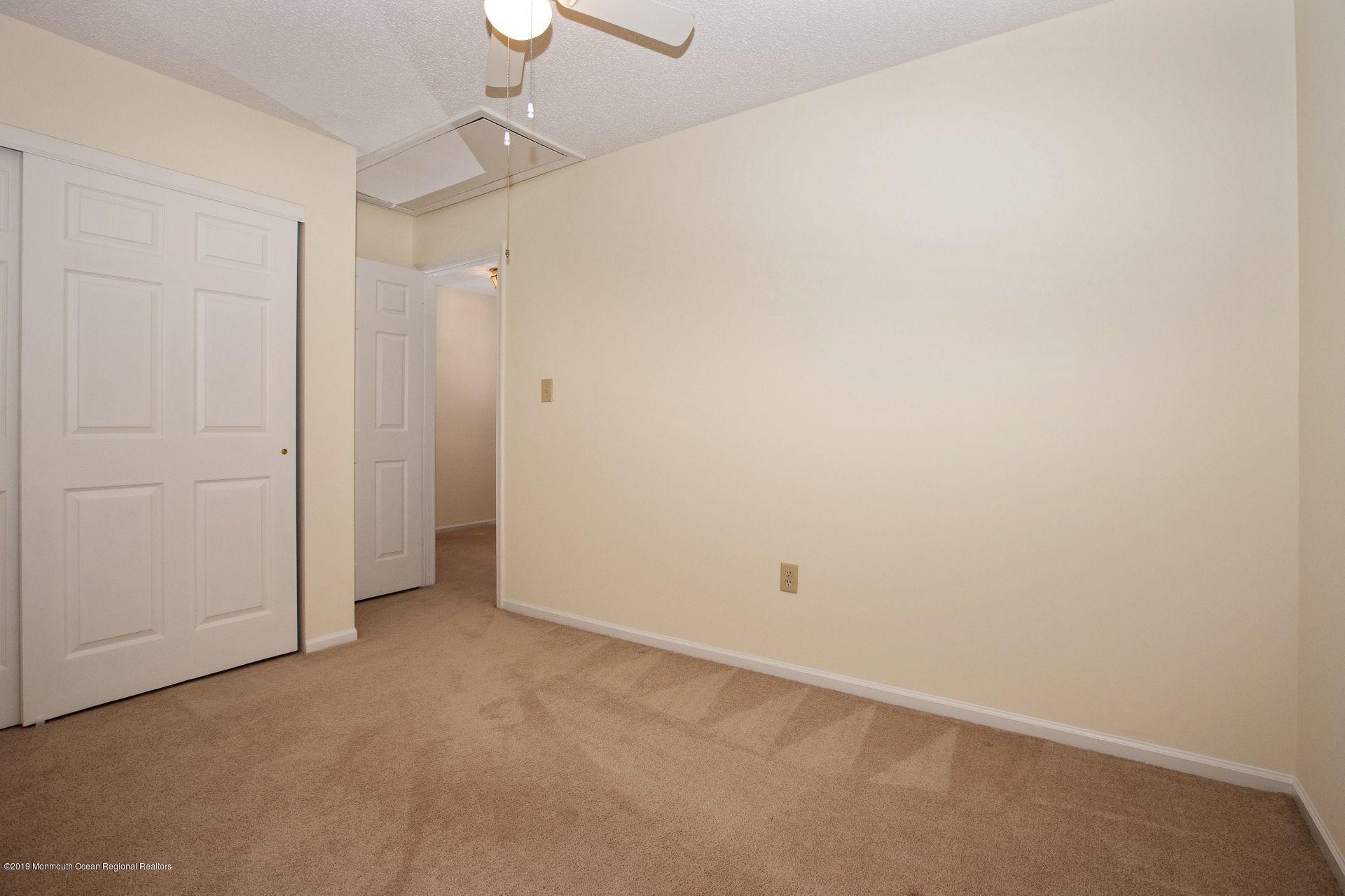 16 Stuart Drive, Unit 8 Freehold, NJ 07728 - Photo 14 of 28 a view of an empty room