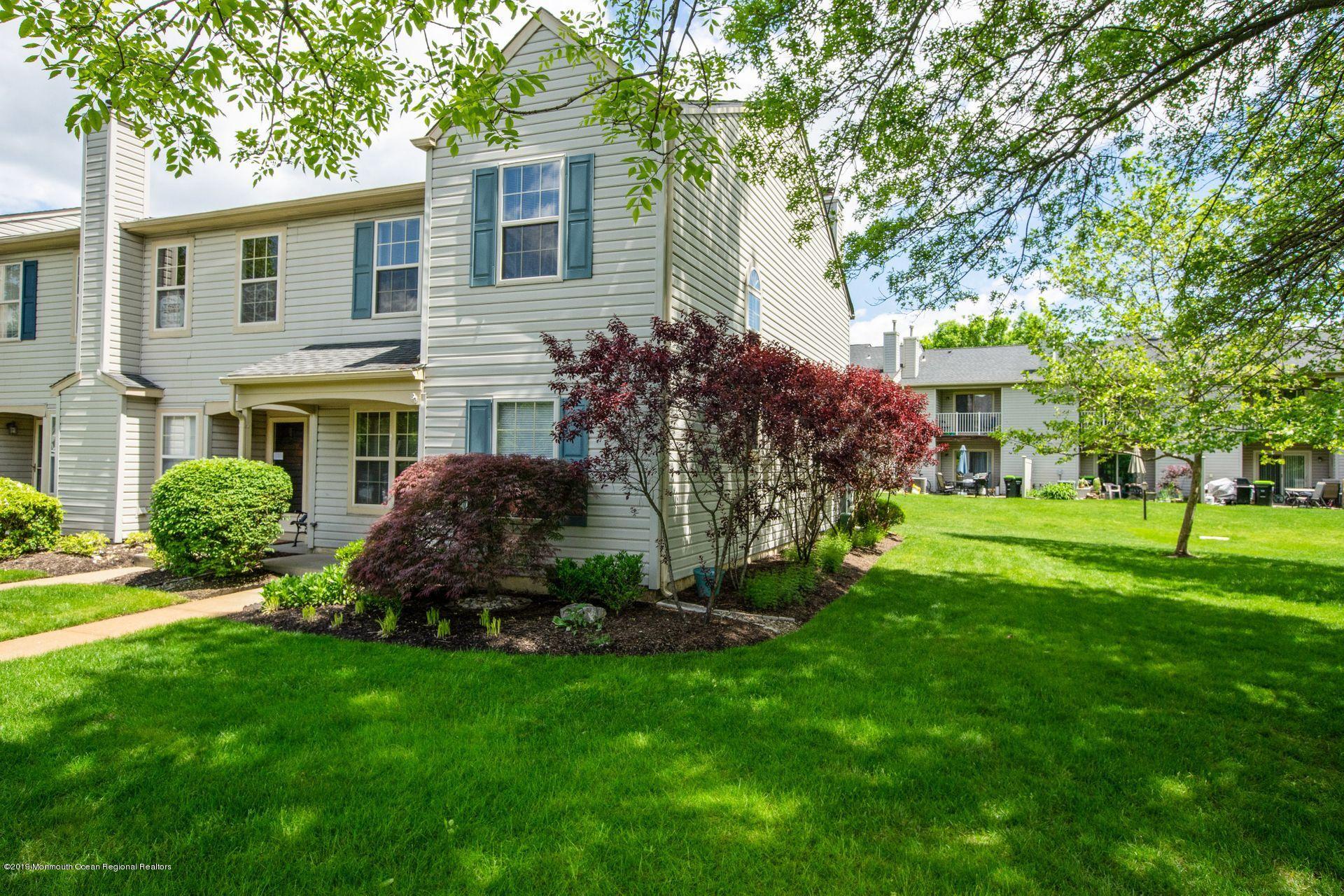 16 Stuart Drive, Unit 8 Freehold, NJ 07728 - Photo 2 of 28 a view of a house with backyard and garden