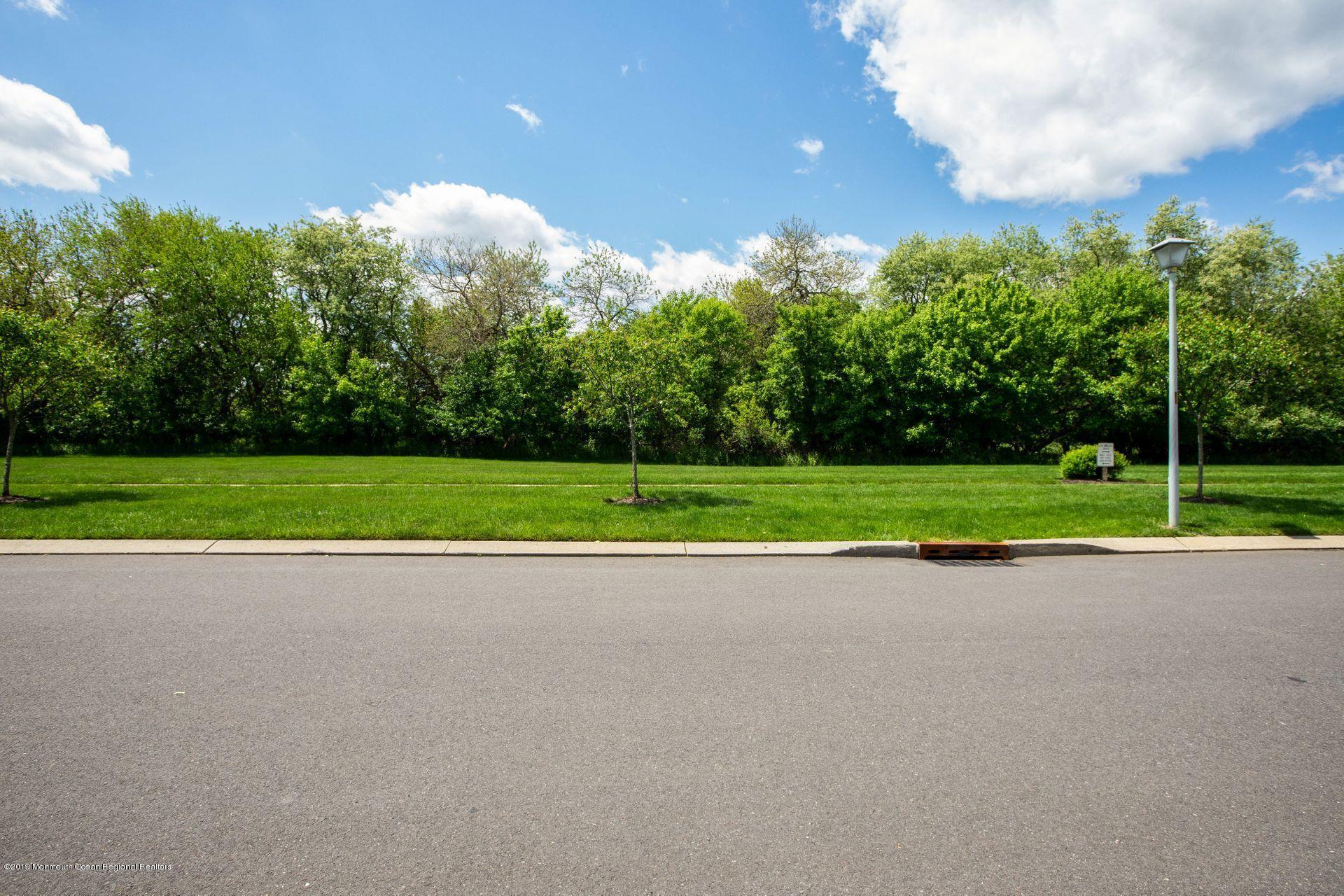 16 Stuart Drive, Unit 8 Freehold, NJ 07728 - Photo 23 of 28 a view of a golf course