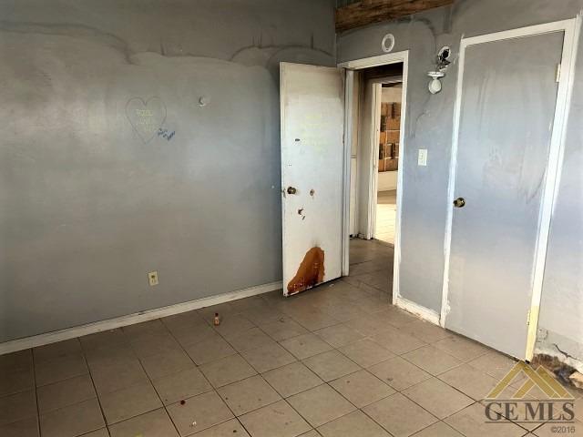 Undisclosed Address Bakersfield, CA 93305 - Photo 8 of 16 an empty room with closet