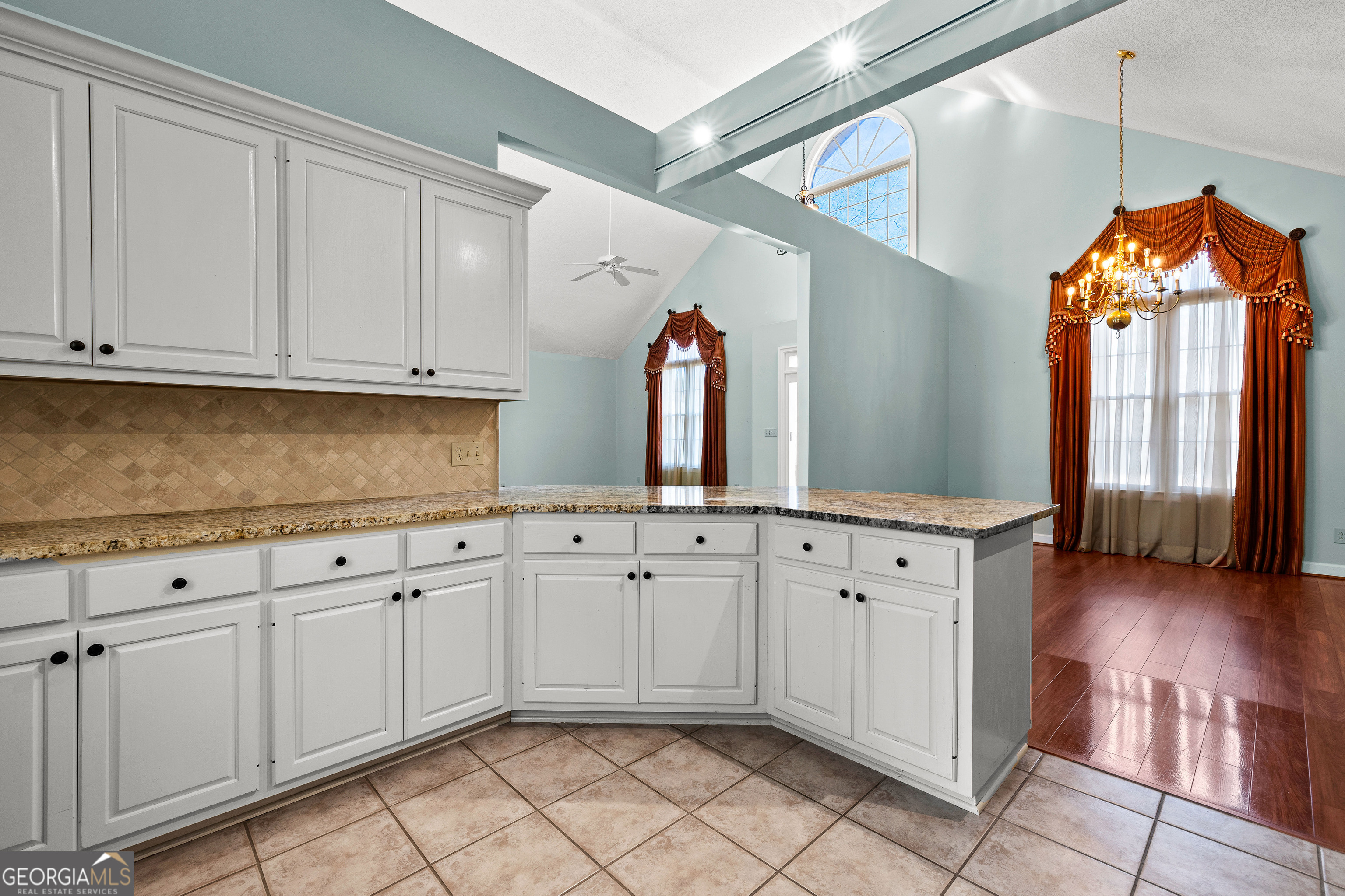100 Beaver Run Trace Thomaston, GA 30286 - Photo 29 of 78 a kitchen with granite countertop white cabinets and white appliances
