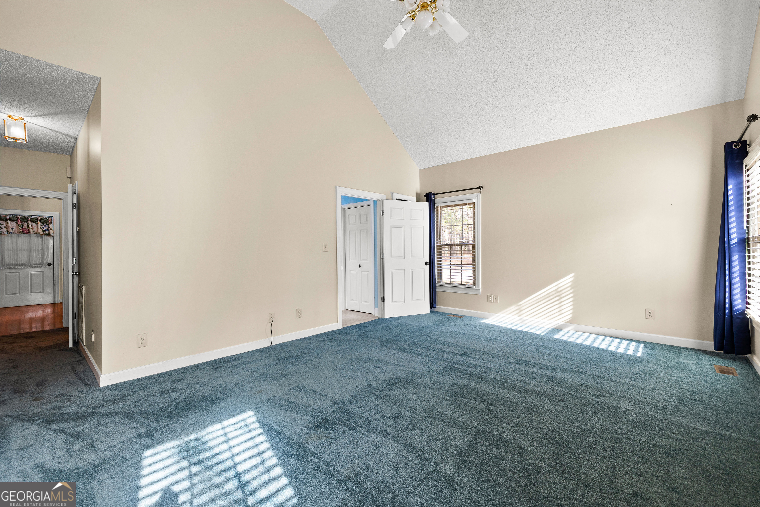 100 Beaver Run Trace Thomaston, GA 30286 - Photo 39 of 78 a view of empty room with wooden floor and fan