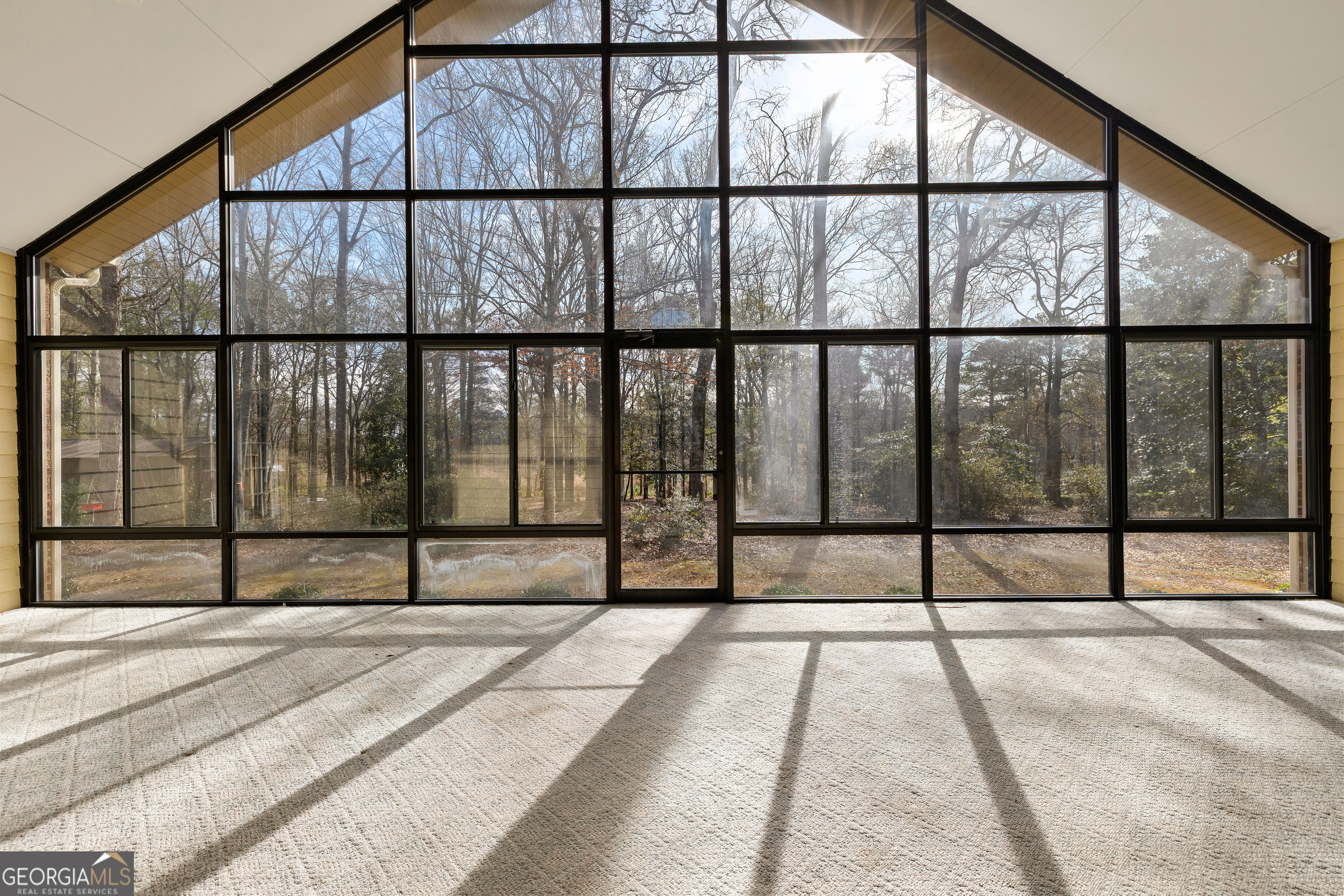 100 Beaver Run Trace Thomaston, GA 30286 - Photo 68 of 78 a view of staircase with white walls and windows