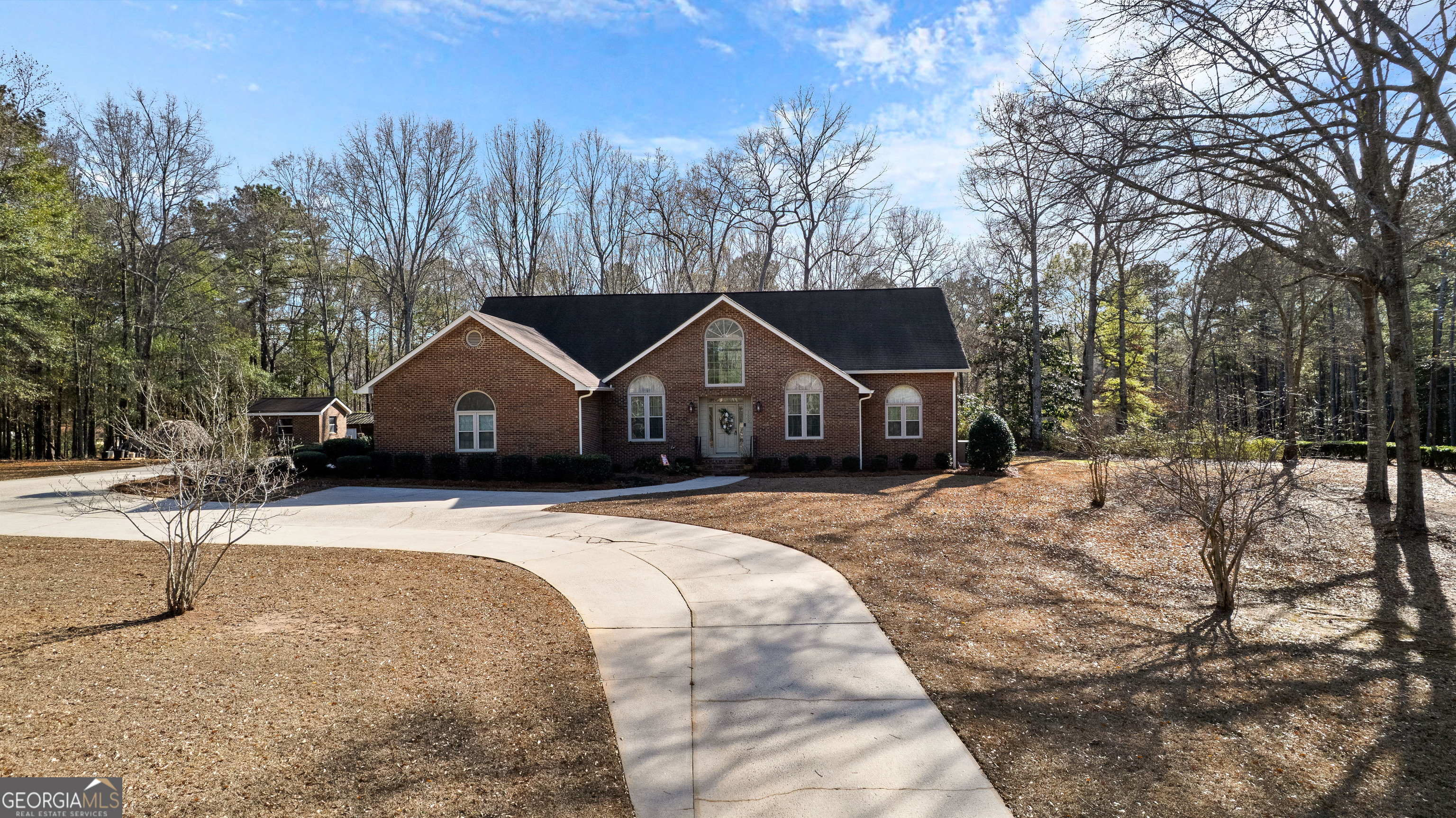 100 Beaver Run Trace Thomaston, GA 30286 - Photo 7 of 78 a house with trees in the background