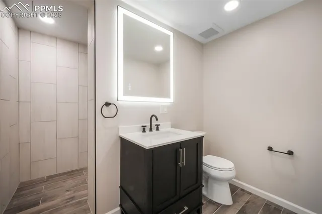 a room with a window and a view of bathroom