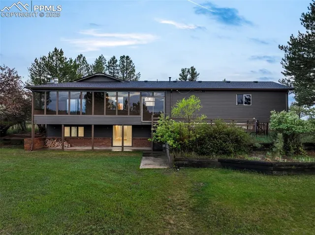 a view of parking garage with cars