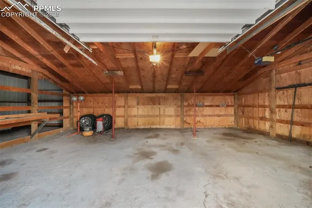 a picture of a bench in front of a white house