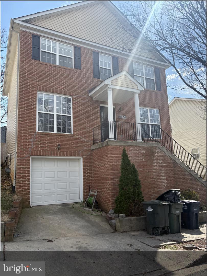 3326 Oxon Run Road Southeast Washington, DC 20032 - Photo 1 of 1 Charming brick home with inviting porch.