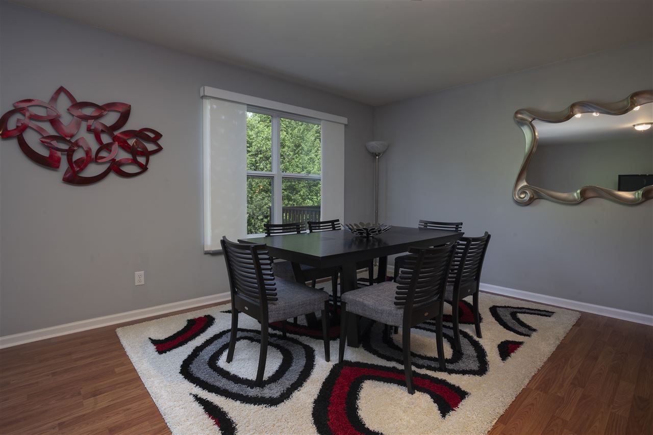 7634 Jockey Drive Loves Park, IL 61111 - Photo 18 of 25 a table and a workspace with furniture