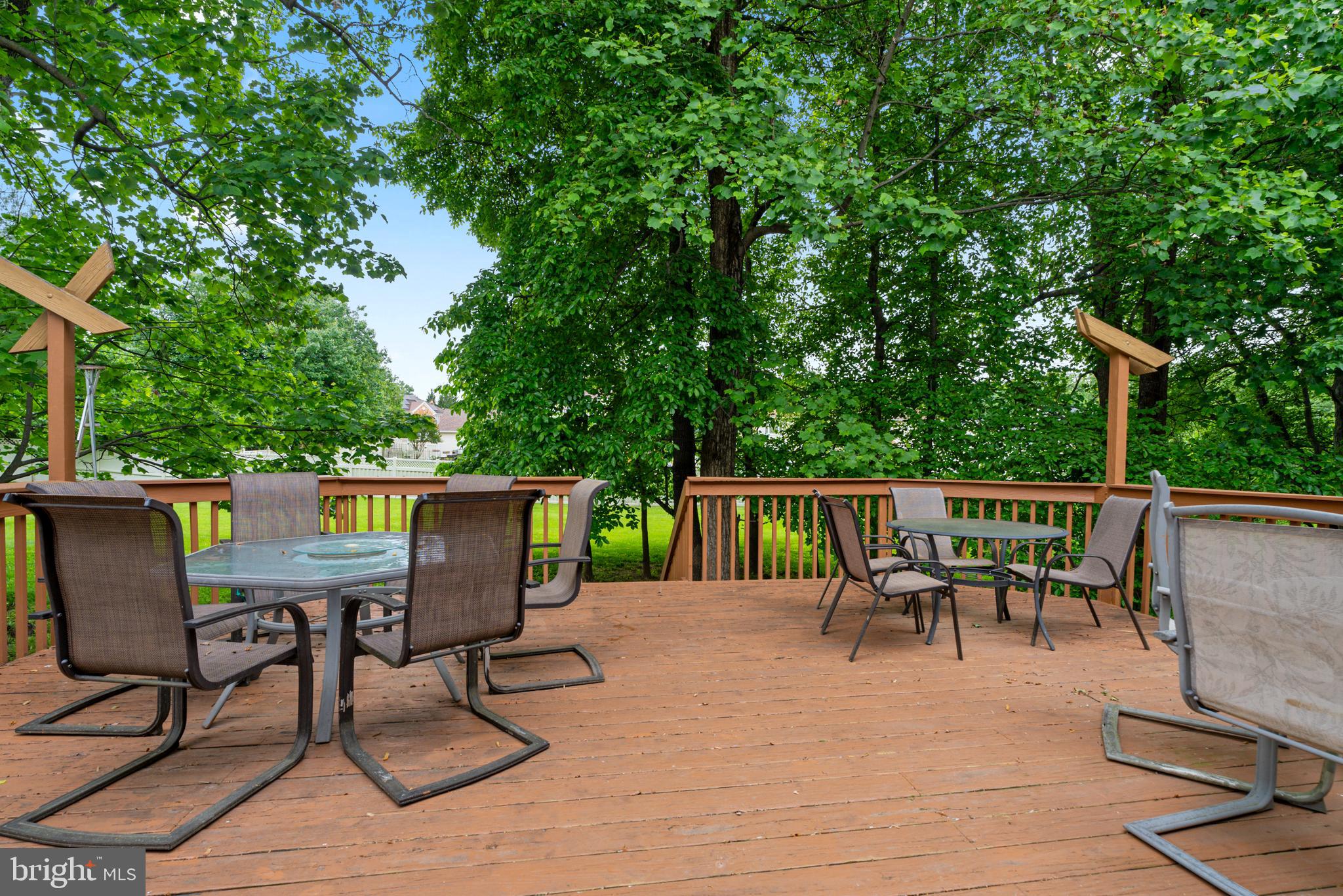 15008 Notley Road Silver Spring, MD 20905 - Photo 17 of 48 a view of a chairs and table on the patio
