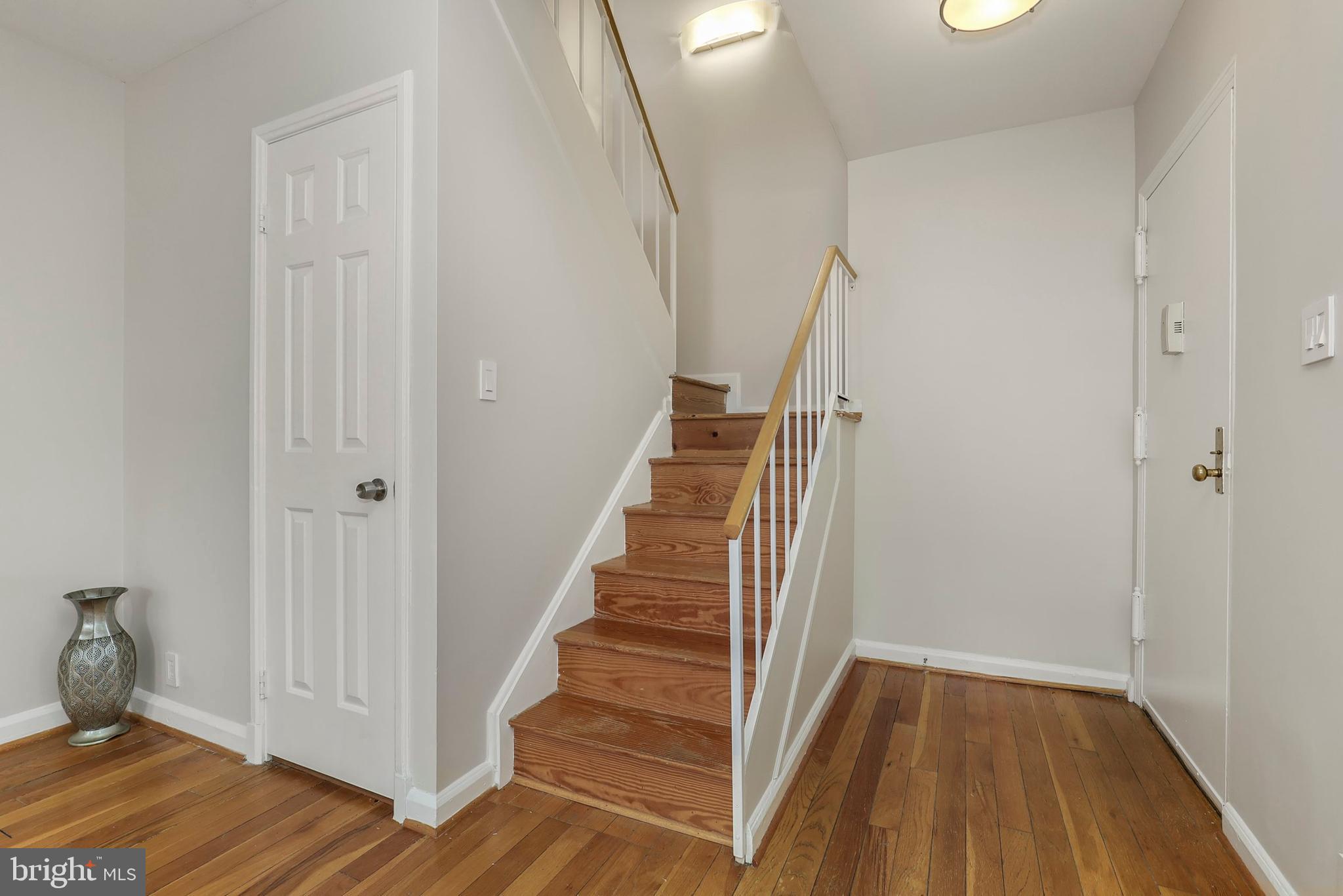 3831 Rodman Street Northwest, Unit F30 Washington, DC 20016 - Photo 23 of 33 a view of entryway with wooden floor