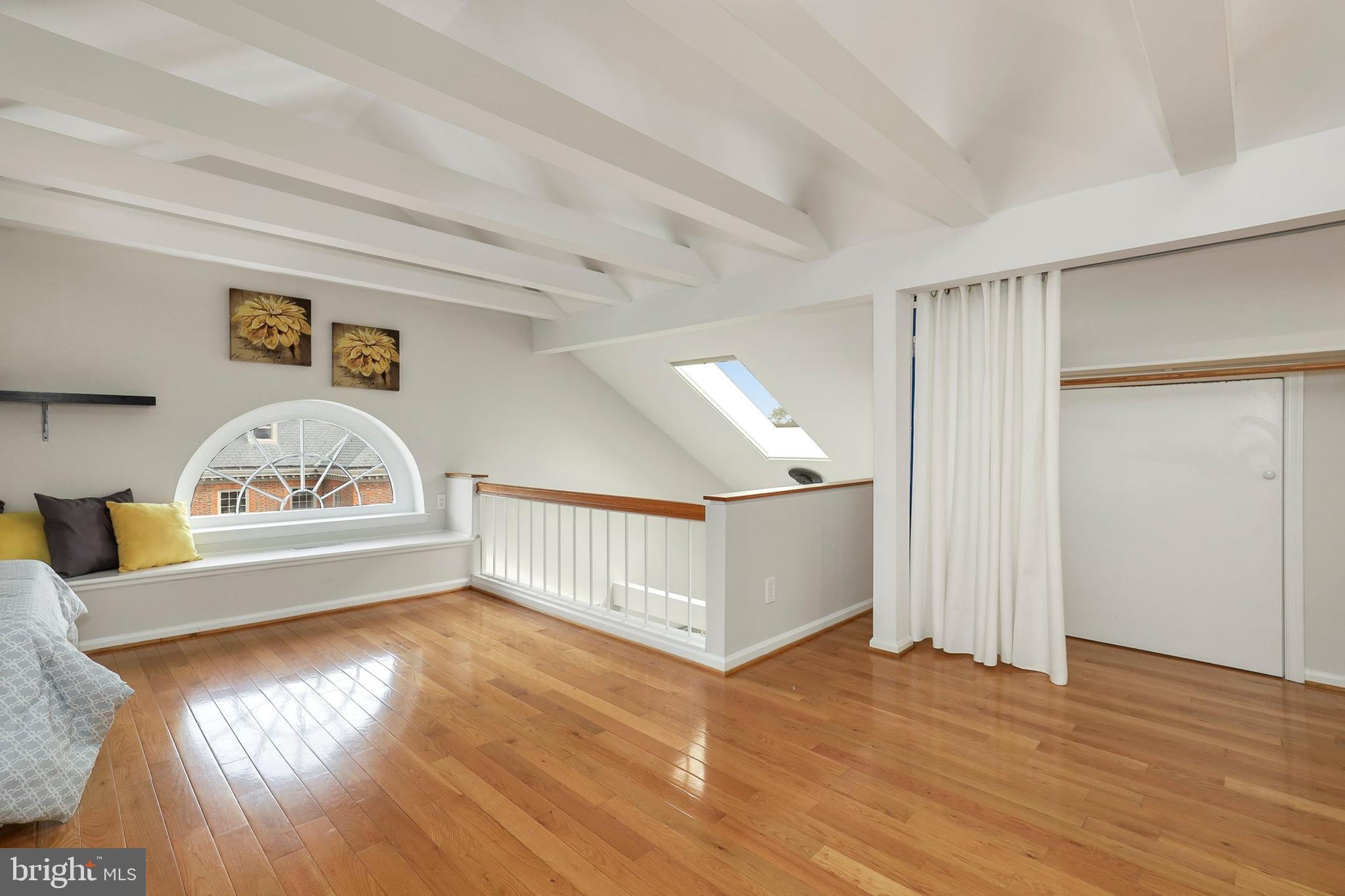 3831 Rodman Street Northwest, Unit F30 Washington, DC 20016 - Photo 30 of 33 a view of livingroom with hardwood floor