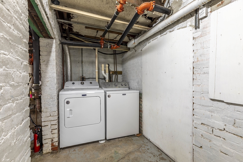 52 Cooper Street, Unit 2 Boston, MA 02113 - Photo 14 of 15 a utility room with dryer and washer