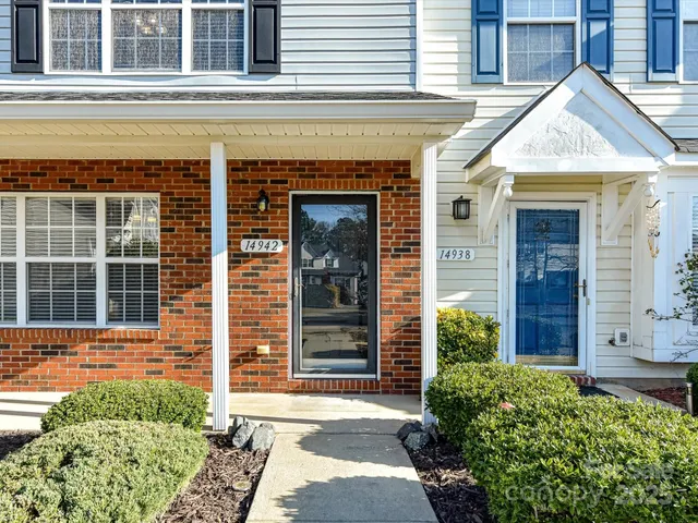 a view of swimming pool with outdoor seating