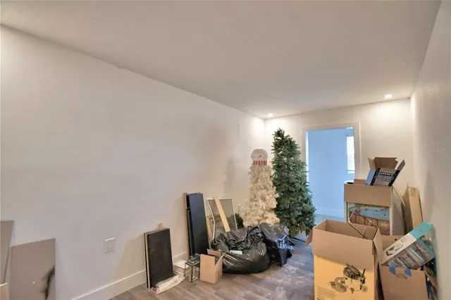 a bathroom with a shower and a glass door