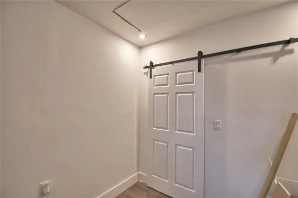 a view of a window in a small bathroom