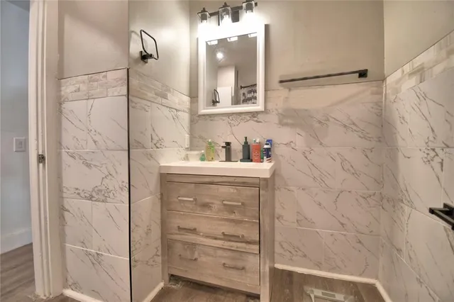 a bathroom with a shower and a shower