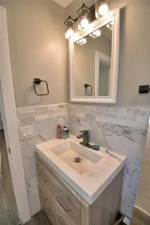 a bedroom with a workspace