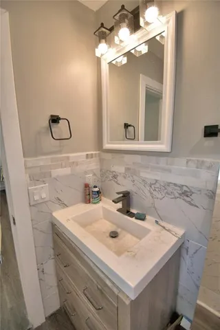 a bedroom with a workspace