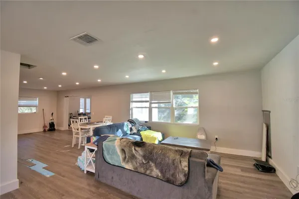 a living room with furniture and a table