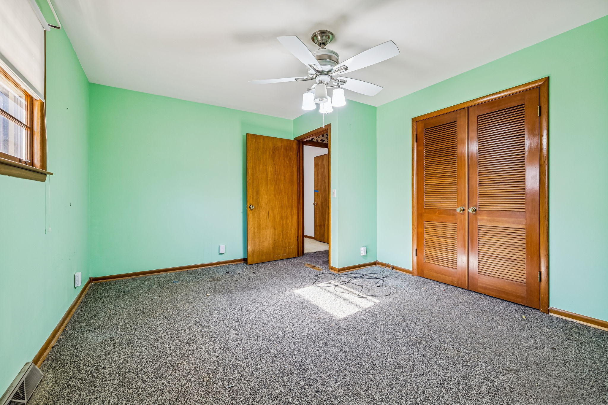 5414 Hill Rd Circle Nashville, TN 37220 - Photo 23 of 51 an empty room with a chandelier fan and closet
